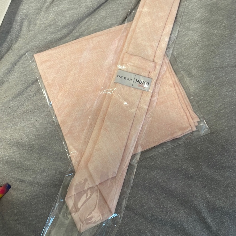 Unopened and brand new tie and pocket square